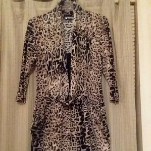 PAPILLON LEOPARD  PRINT, SIZE MEDIUM, LIKE NEW